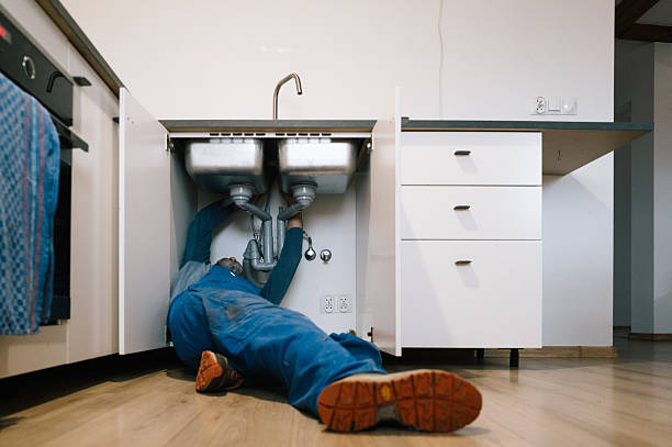 Professional Drain Cleaning technician working in Fowler, MI